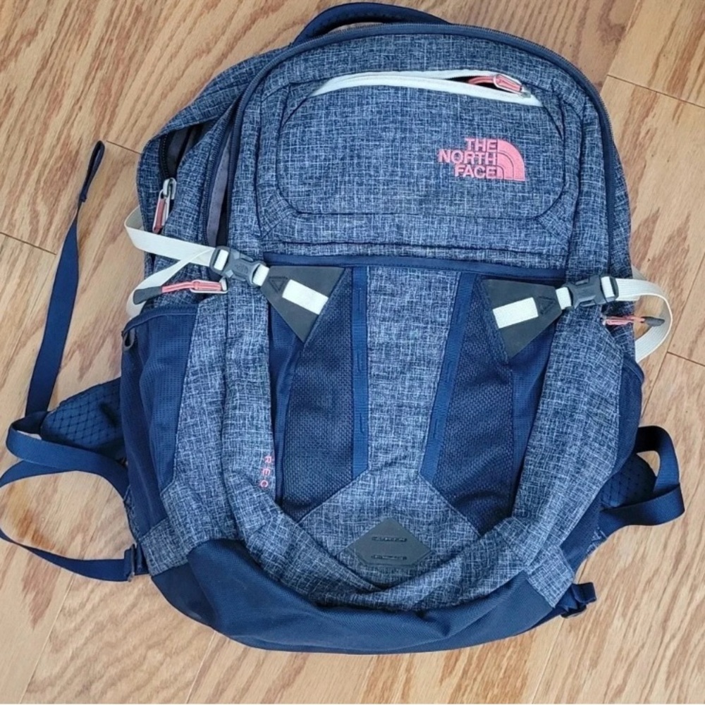 The North Face Blue Backpack with Padded Straps and Durable Design